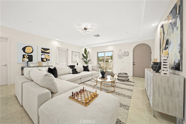 living room featuring light tile flooring