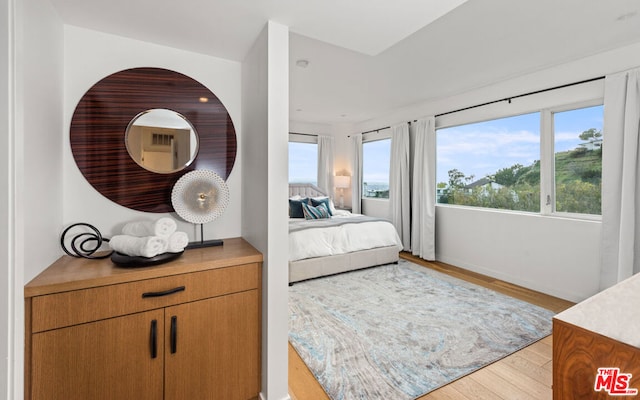 bedroom featuring light hardwood / wood-style floors