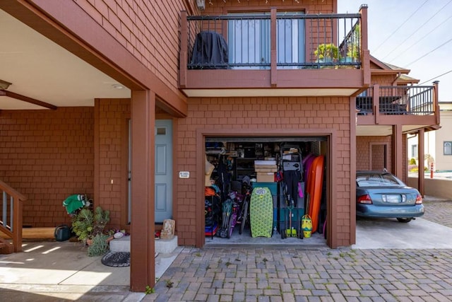 entrance to property with a balcony