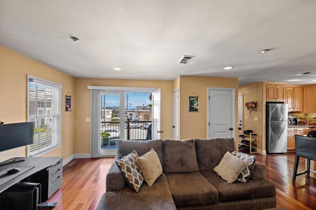 living room with hardwood / wood-style flooring