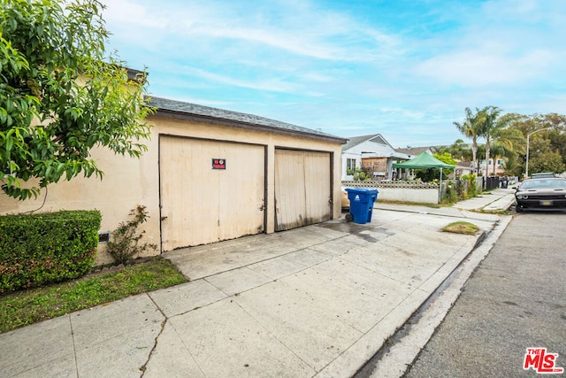 view of outbuilding featuring a garage