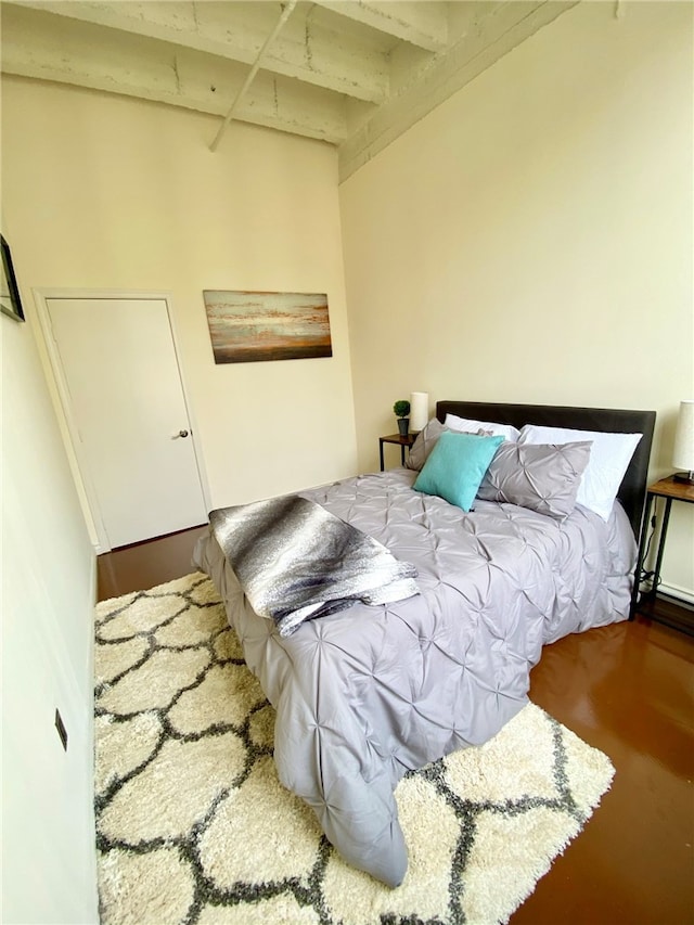 bedroom with beamed ceiling