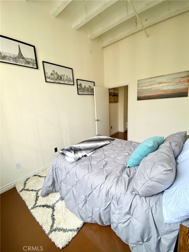 bedroom with beamed ceiling