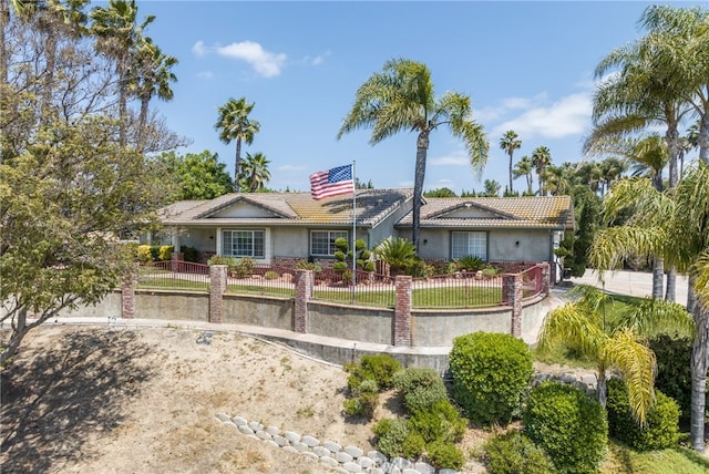 single story home with a front yard