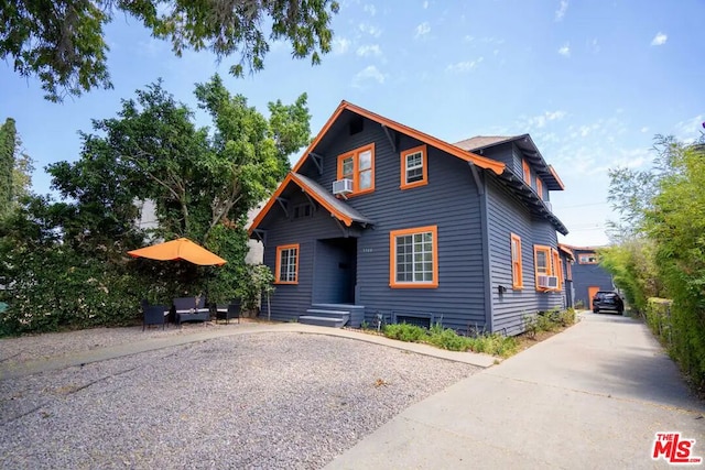 view of front of property featuring cooling unit