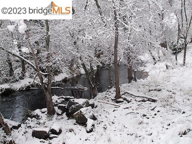 view of snow covered land