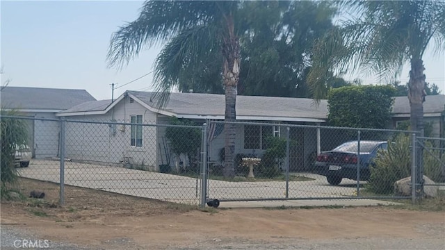 477 County Line Rd, Calimesa, CA 92320 - single story home with a fenced front yard and driveway