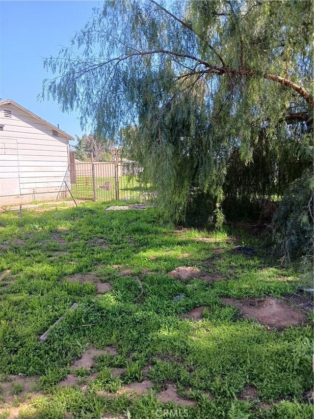 477 County Line Rd, Calimesa, CA 92320 - view of yard featuring fence