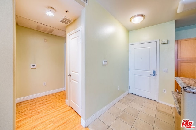 foyer featuring light wood-type flooring