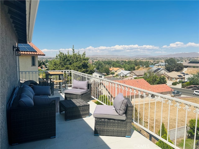 balcony with an outdoor hangout area