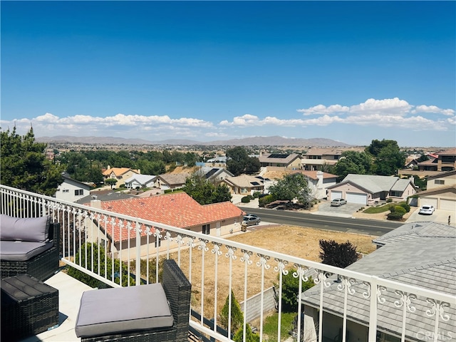 balcony featuring a mountain view