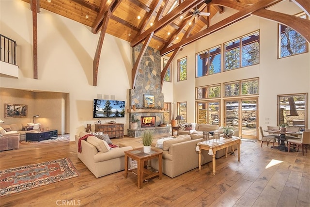 42143 Switzerland Dr, Big Bear, CA 92315 - living room featuring high vaulted ceiling, wooden ceiling, beam ceiling, wood-type flooring, and ceiling fan