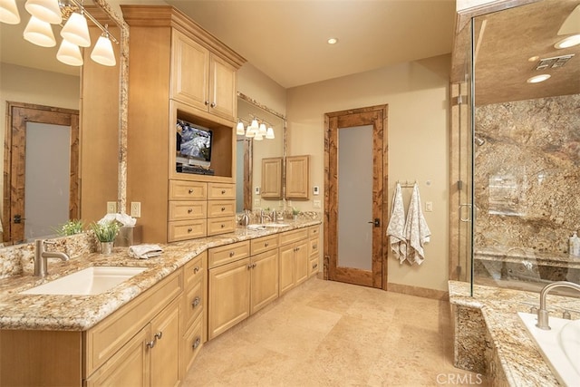 42143 Switzerland Dr, Big Bear, CA 92315 - bathroom with a shower stall, double vanity, a bathtub, baseboards, and recessed lighting