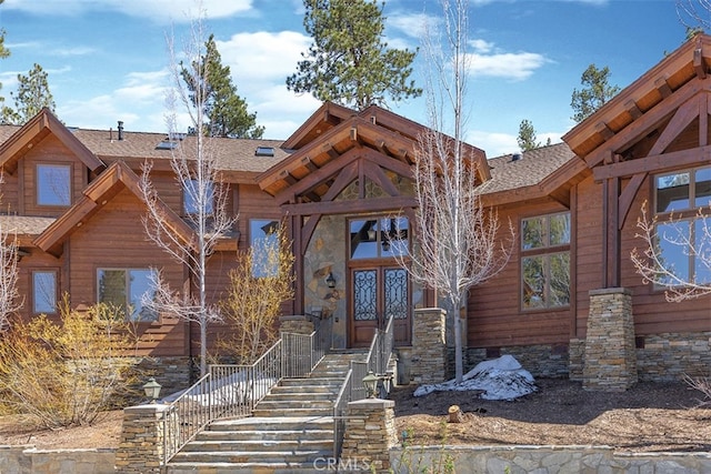 42143 Switzerland Dr, Big Bear, CA 92315 - view of front of home with french doors and roof with shingles