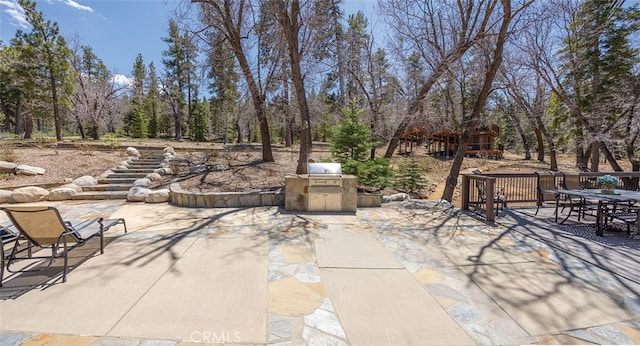 42143 Switzerland Dr, Big Bear, CA 92315 - view of patio / terrace featuring outdoor dining area and view of scattered trees