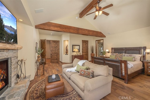 42143 Switzerland Dr, Big Bear, CA 92315 - bedroom featuring a fireplace, wood-type flooring, beam ceiling, recessed lighting, and high vaulted ceiling