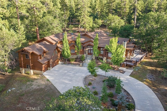 42143 Switzerland Dr, Big Bear, CA 92315 - view of subject property featuring a heavily wooded area