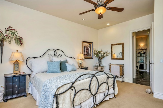 carpeted bedroom with ceiling fan