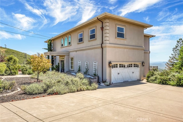 view of front of property with a garage