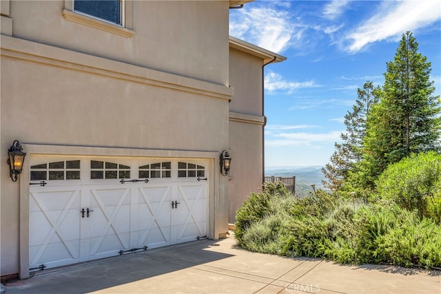 garage featuring a mountain view