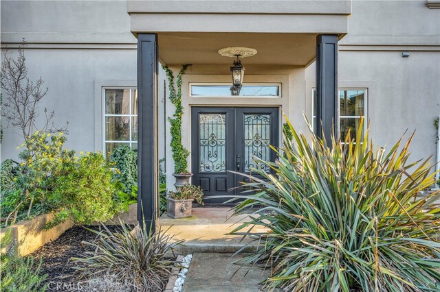 view of exterior entry with french doors