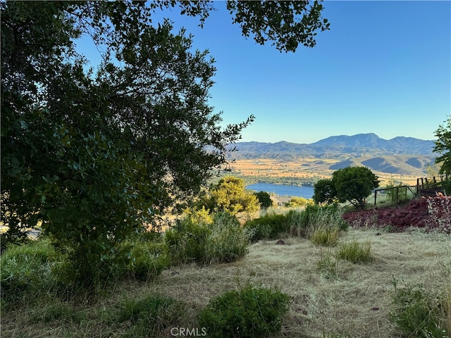 mountain view featuring a water view