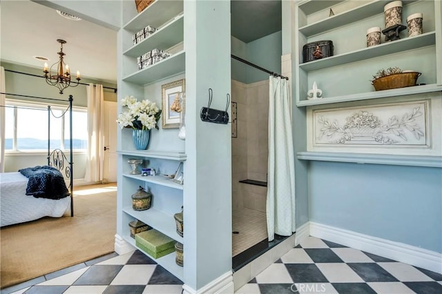 15893 Little Peak Rd, Hidden Valley Lake, CA 95467 - bathroom with a chandelier, a tile shower, and tile patterned floors