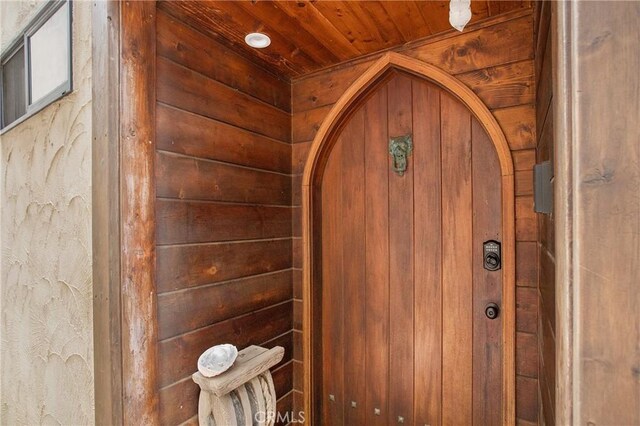 room details with wood walls and wood ceiling