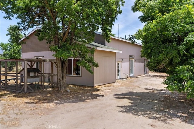 view of home's exterior featuring an outdoor structure and exterior structure