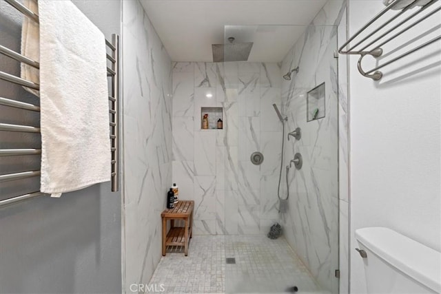 bathroom with a marble finish shower and toilet