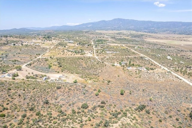 aerial view with a mountain view and a desert view