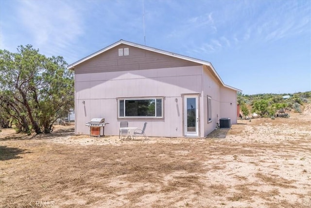 back of property with cooling unit