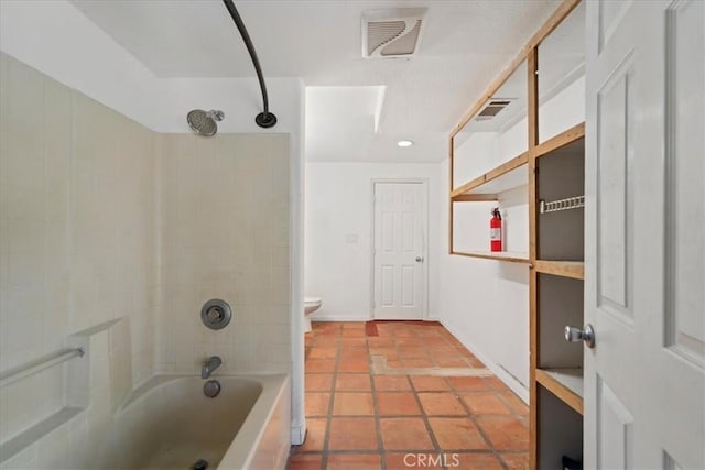 bathroom with  shower combination, tile patterned flooring, visible vents, and toilet