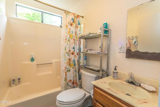 full bathroom with shower / tub combo, vanity, and toilet