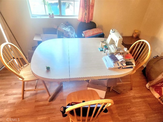 dining area featuring hardwood / wood-style flooring