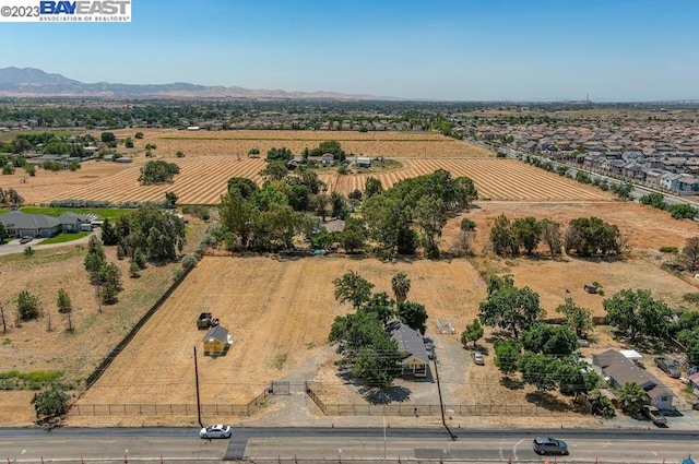 aerial view with a mountain view and a rural view