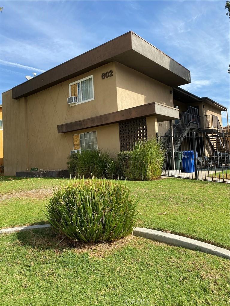 view of property exterior featuring a yard