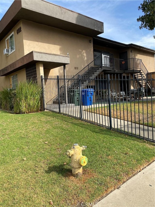 602 Karesh Ave, Pomona, CA 91767 - view of side of home with stairs and stucco siding
