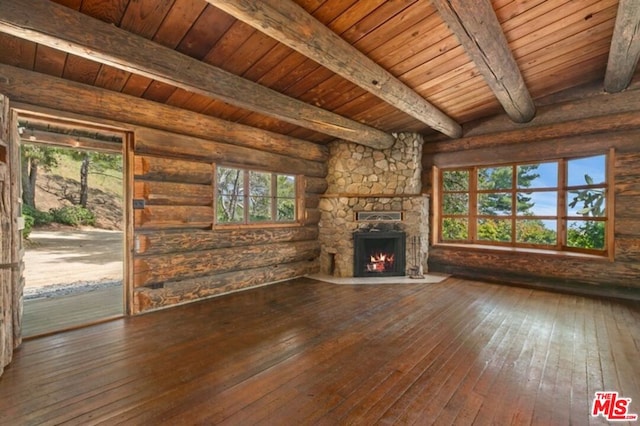 unfurnished living room featuring wooden ceiling, rustic walls, and dark hardwood / wood-style flooring