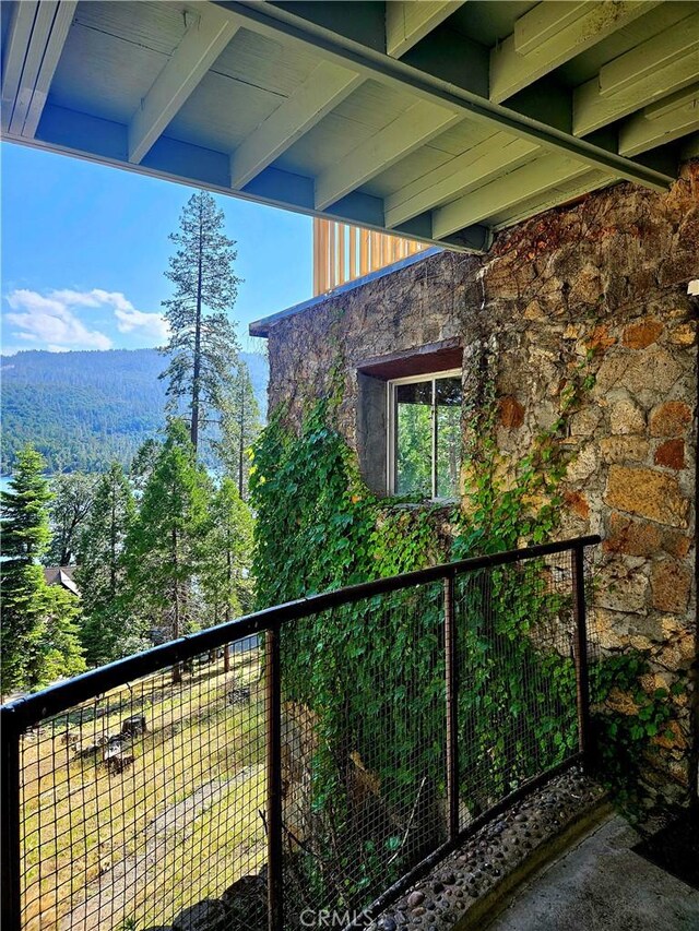 balcony featuring a mountain view