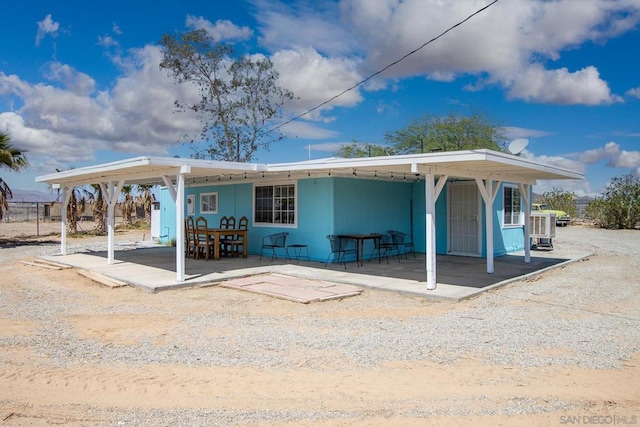 rear view of house featuring a patio area