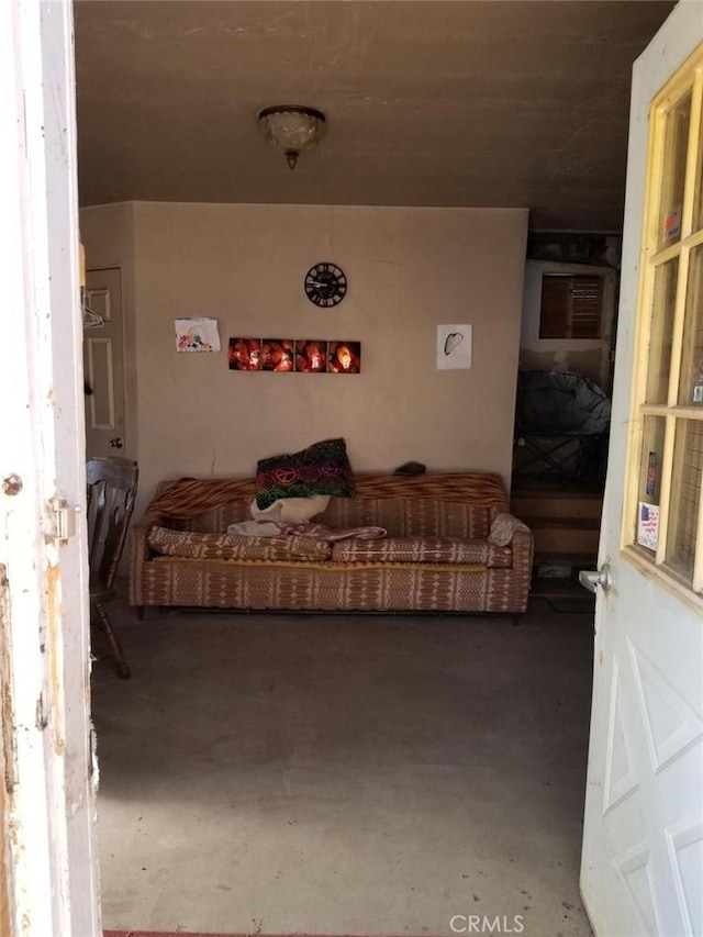 living room with concrete floors