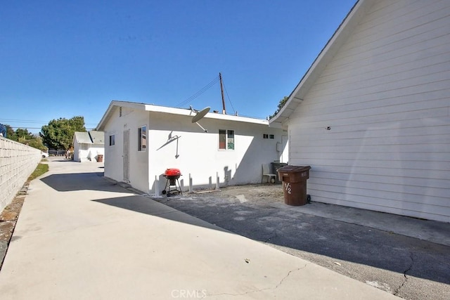 view of home's exterior with a patio area