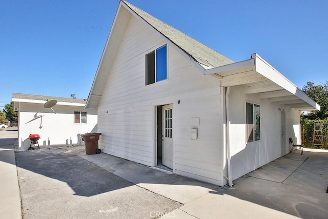 back of house featuring a patio