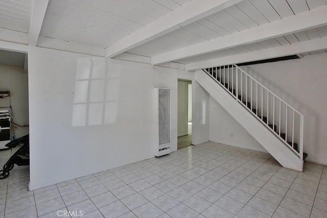 basement featuring light tile patterned floors