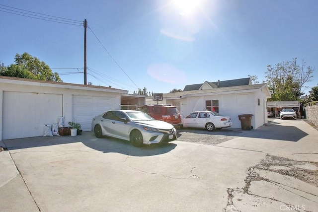 exterior space featuring an outbuilding and a garage