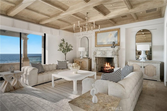 living room featuring wooden ceiling, coffered ceiling, a water view, a premium fireplace, and beamed ceiling