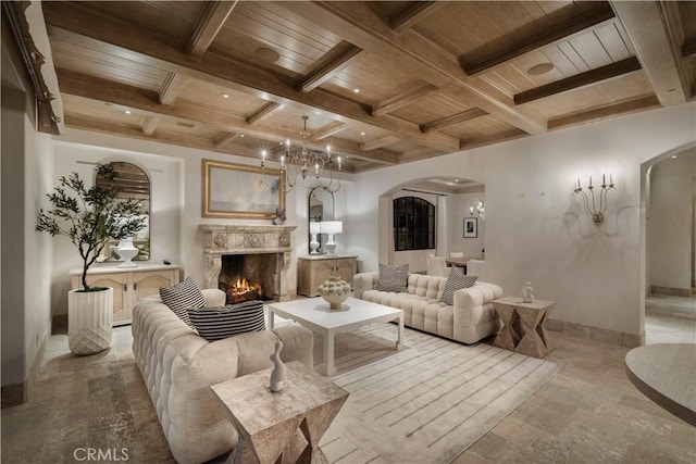 living room featuring beam ceiling, wooden ceiling, and coffered ceiling