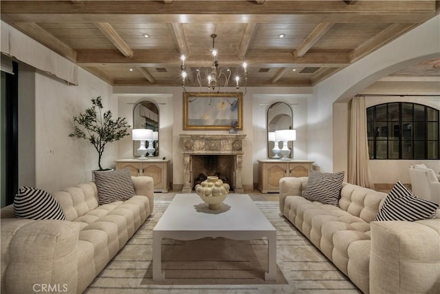 living room featuring beam ceiling, wooden ceiling, and coffered ceiling