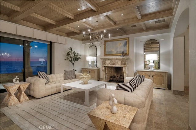 living room featuring beam ceiling, wooden ceiling, and coffered ceiling